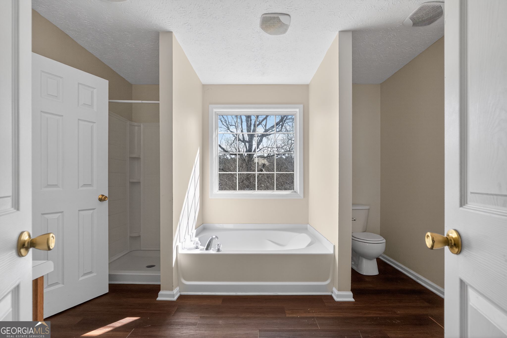 3255 River Run Trail Decatur, GA 30034 - Photo 30 of 37 a bathroom with bathtub and window