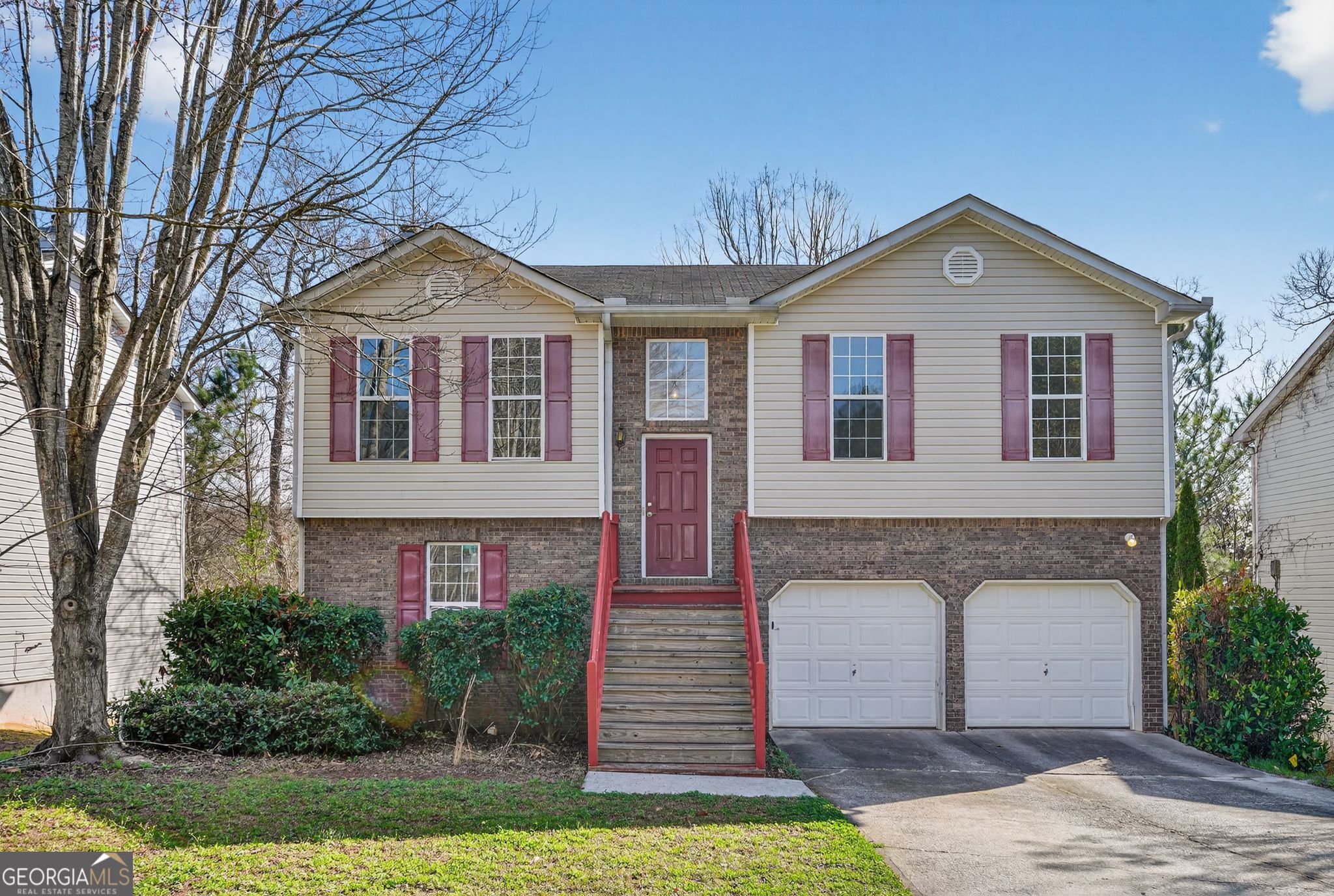 3255 River Run Trail Decatur, GA 30034 - Photo 3 of 37 a front view of a house with garden
