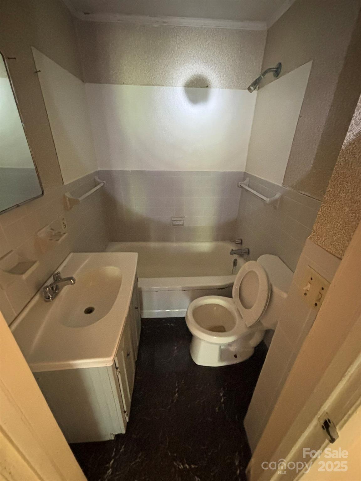 108 Circle Drive Mount Gilead, NC 27306 - Photo 15 of 19 a bathroom with a sink and a mirror