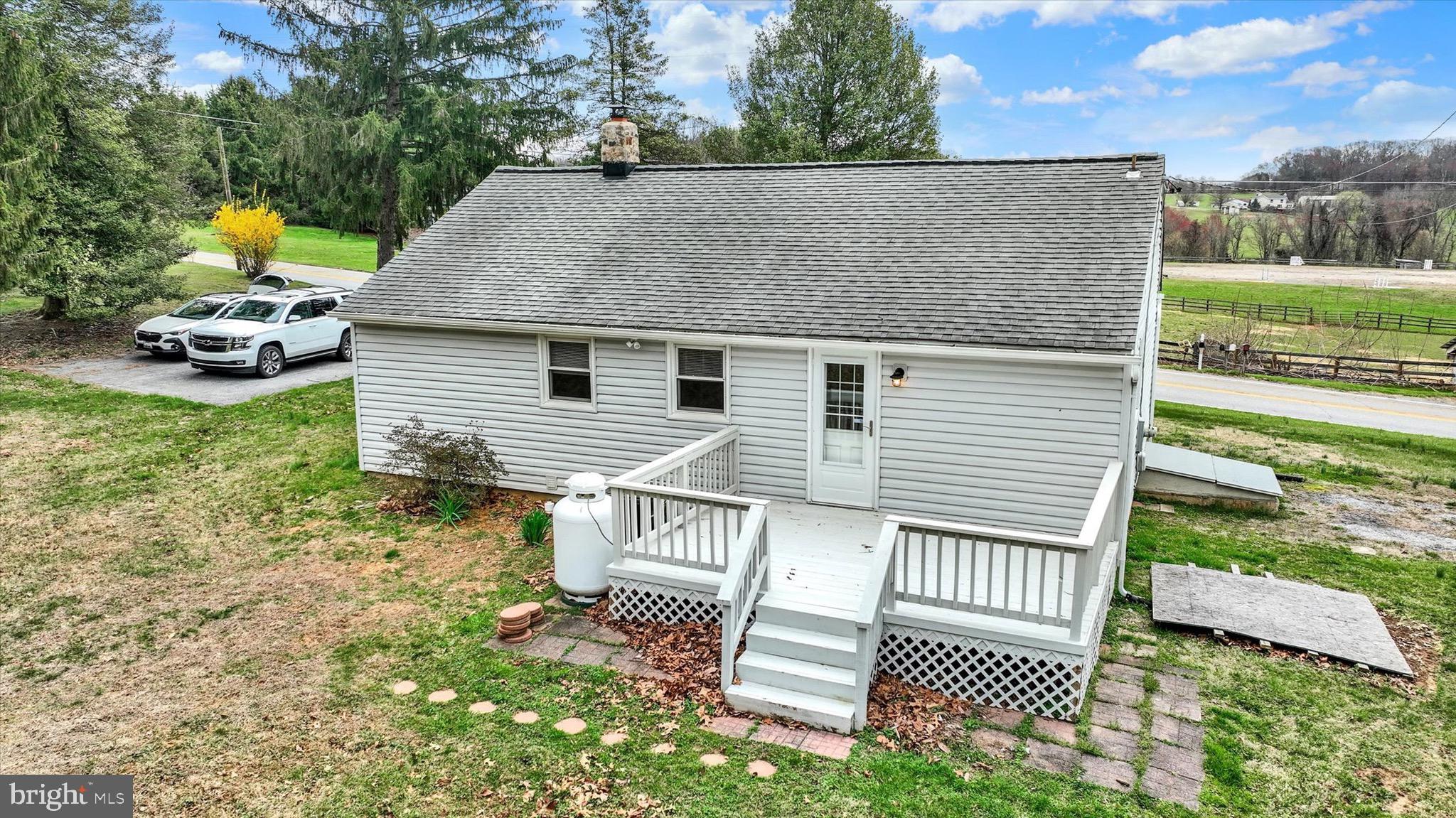 19638 Graystone Road White Hall, MD 21161 - Photo 23 of 32 a view of a house with a yard and sitting area