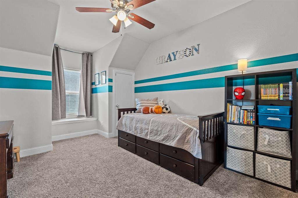 220 Flower Ridge Drive Fort Worth, TX 76108 - Photo 24 of 34 a bedroom with furniture and a window