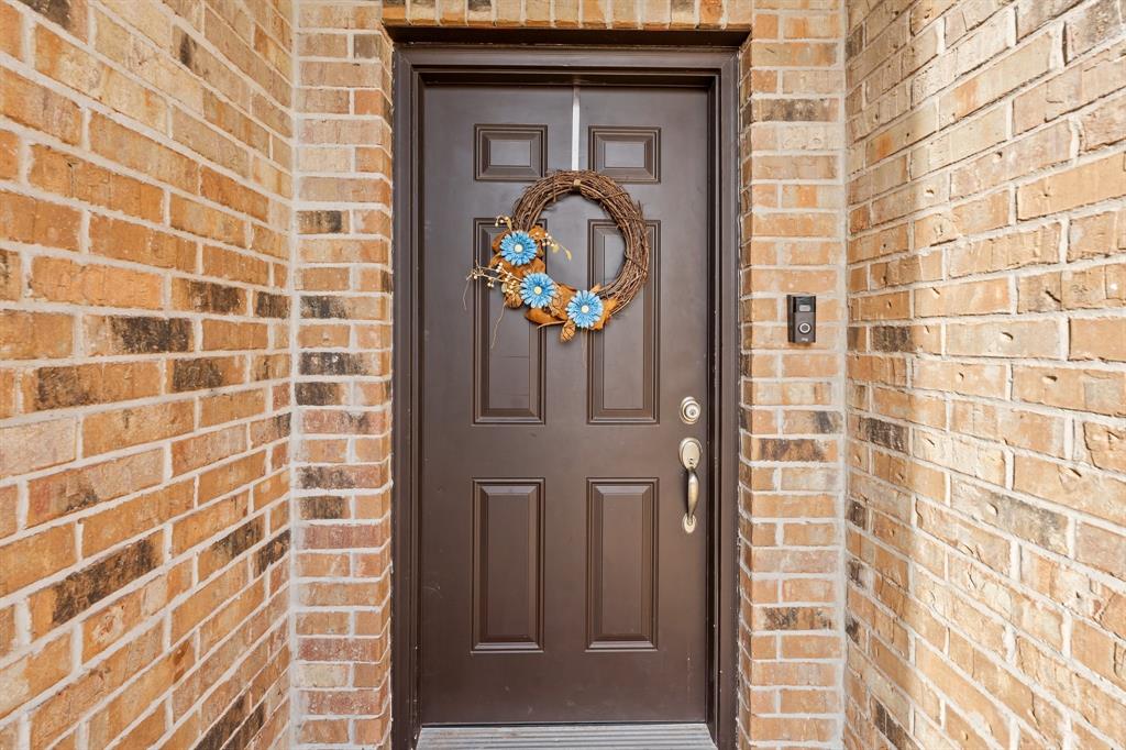 220 Flower Ridge Drive Fort Worth, TX 76108 - Photo 6 of 34 a view of a door of the house