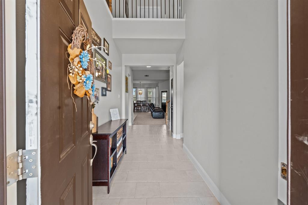 220 Flower Ridge Drive Fort Worth, TX 76108 - Photo 7 of 34 a view of hallway with furniture