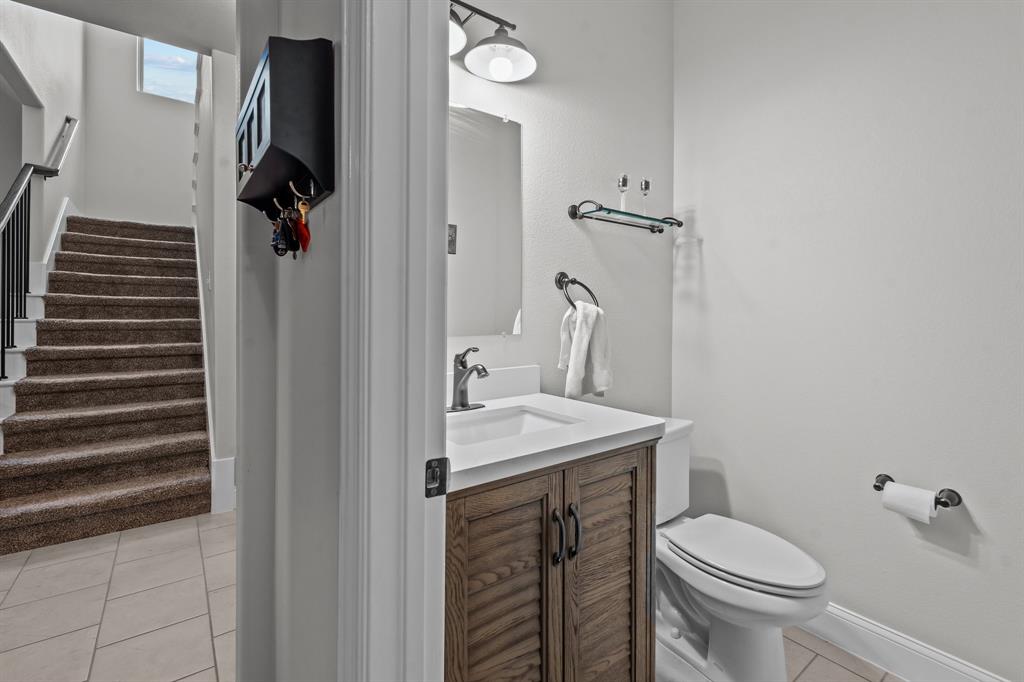 220 Flower Ridge Drive Fort Worth, TX 76108 - Photo 10 of 34 a bathroom with a sink toilet and shower
