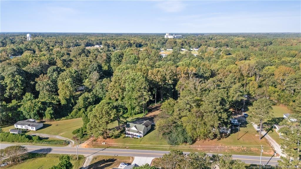 0 Fire Dept Road Smithfield, NC 27577 - Photo 26 of 34 an aerial view of residential houses with outdoor space and trees