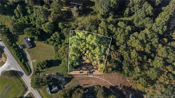 an aerial view of a house having yard