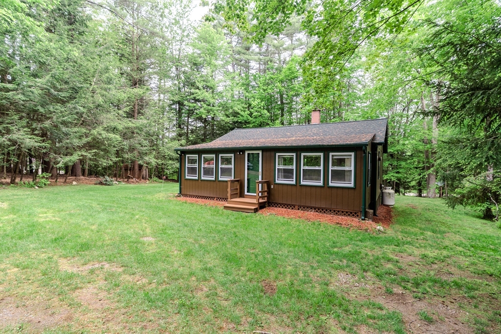 32 Birch Road Goshen, MA 01096 - Photo 4 of 26 a view of an house with backyard space and balcony