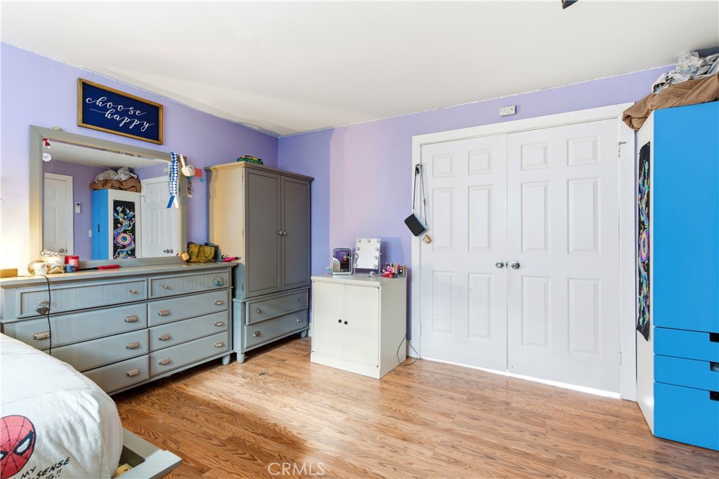 5652 Sycamore Street Wrightwood, CA 92397 - Photo 25 of 50 a room with a bed and a dresser