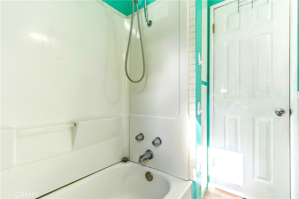 5652 Sycamore Street Wrightwood, CA 92397 - Photo 28 of 50 a bathroom with a bath tub and shower