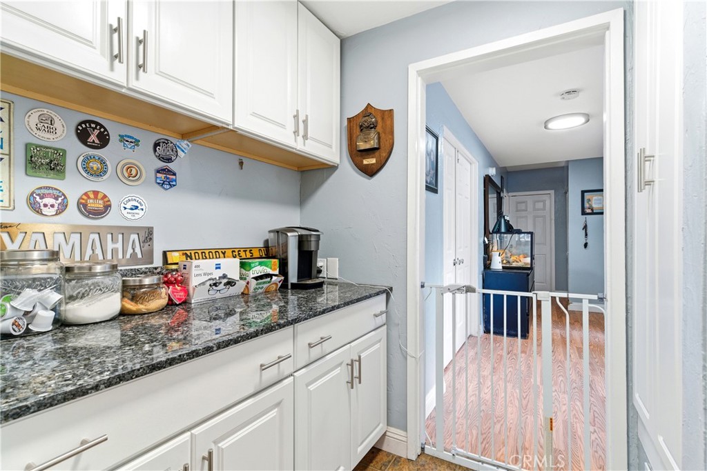 5652 Sycamore Street Wrightwood, CA 92397 - Photo 35 of 50 a kitchen with lots of counter space and wooden floor