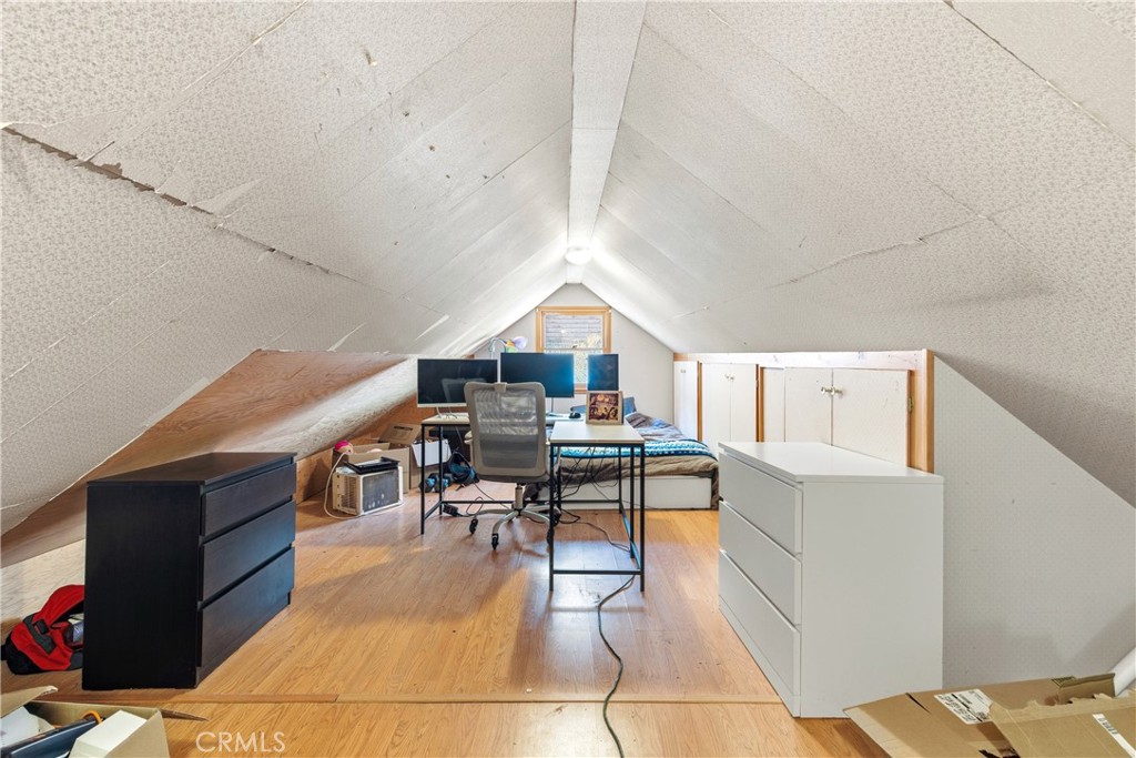 5652 Sycamore Street Wrightwood, CA 92397 - Photo 42 of 50 a living room with furniture a dining table and chairs with wooden floor