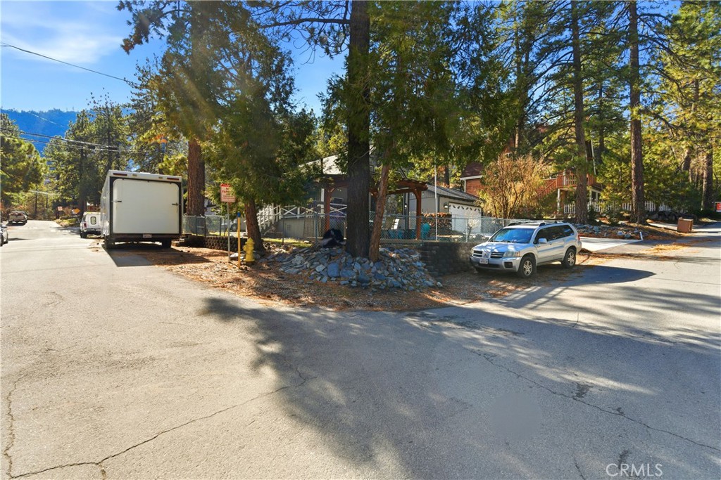 5652 Sycamore Street Wrightwood, CA 92397 - Photo 43 of 50 a view of road with card parked on side and road