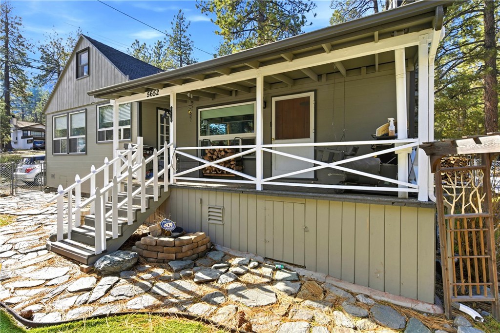 5652 Sycamore Street Wrightwood, CA 92397 - Photo 8 of 50 a house with trees in front of it