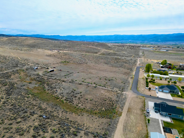 600 East E Street Moroni, UT 84646 - Photo 4 of 38 Expansive rural acreage featuring distant mountain ranges and scattered brush