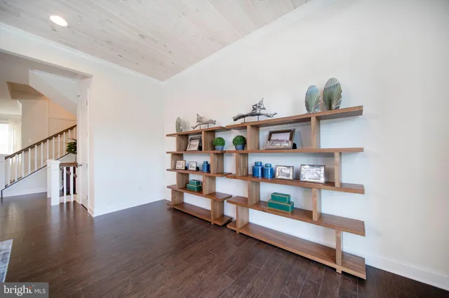 a room with furniture and a window