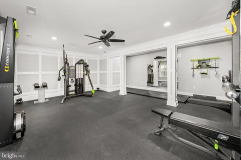 a bathroom with a mirror and a sink