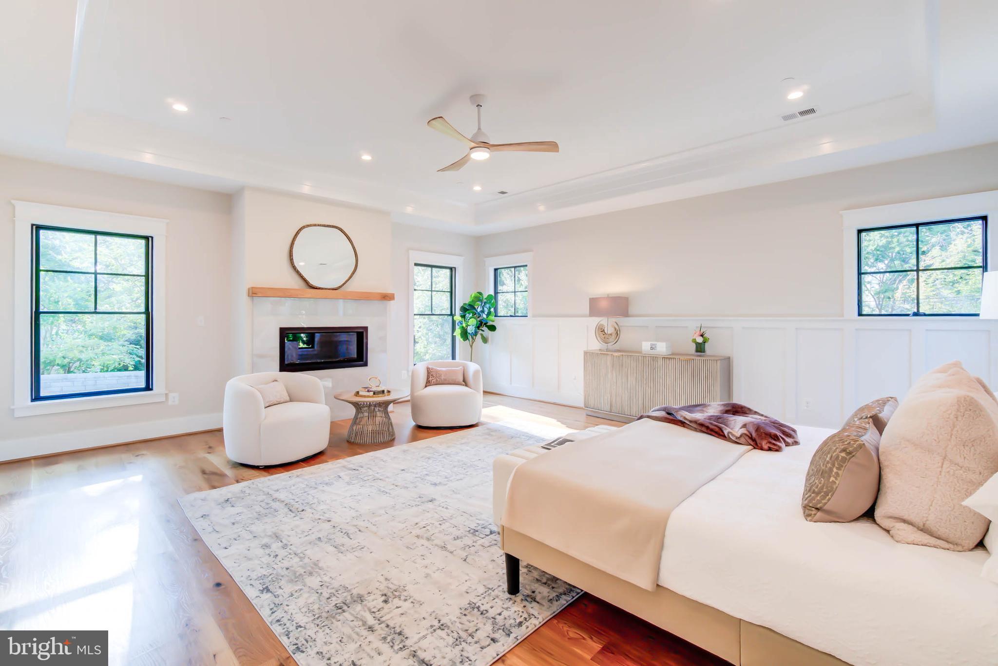 7818 Glenbrook Road Bethesda, MD 20814 - Photo 53 of 95 a bedroom with a large bed and a couch