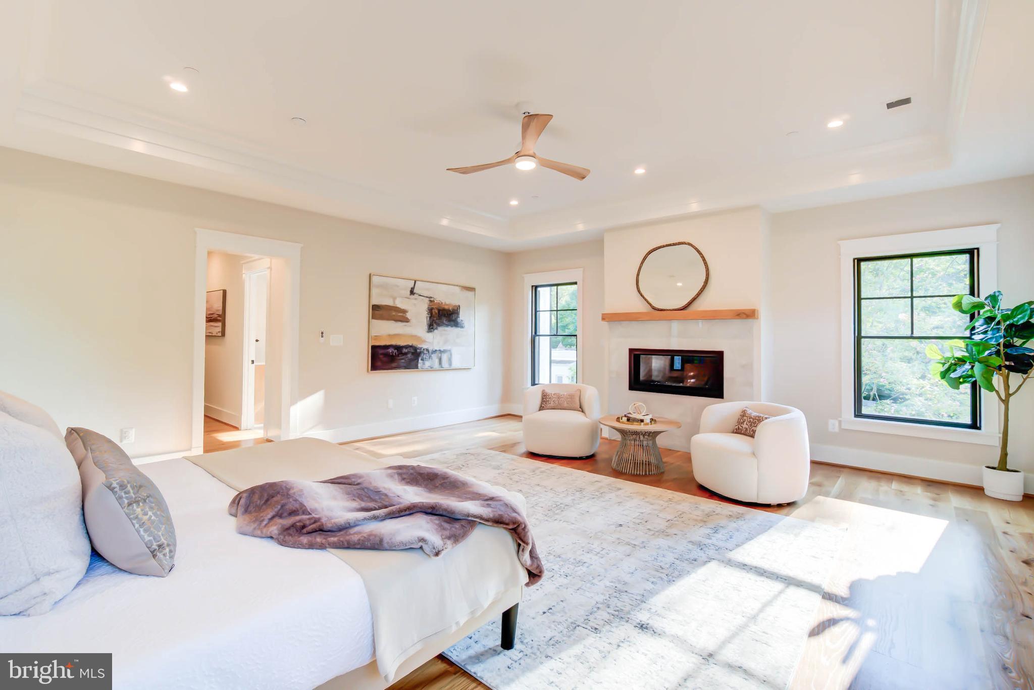 7818 Glenbrook Road Bethesda, MD 20814 - Photo 54 of 95 a bedroom with a large bed and a couch