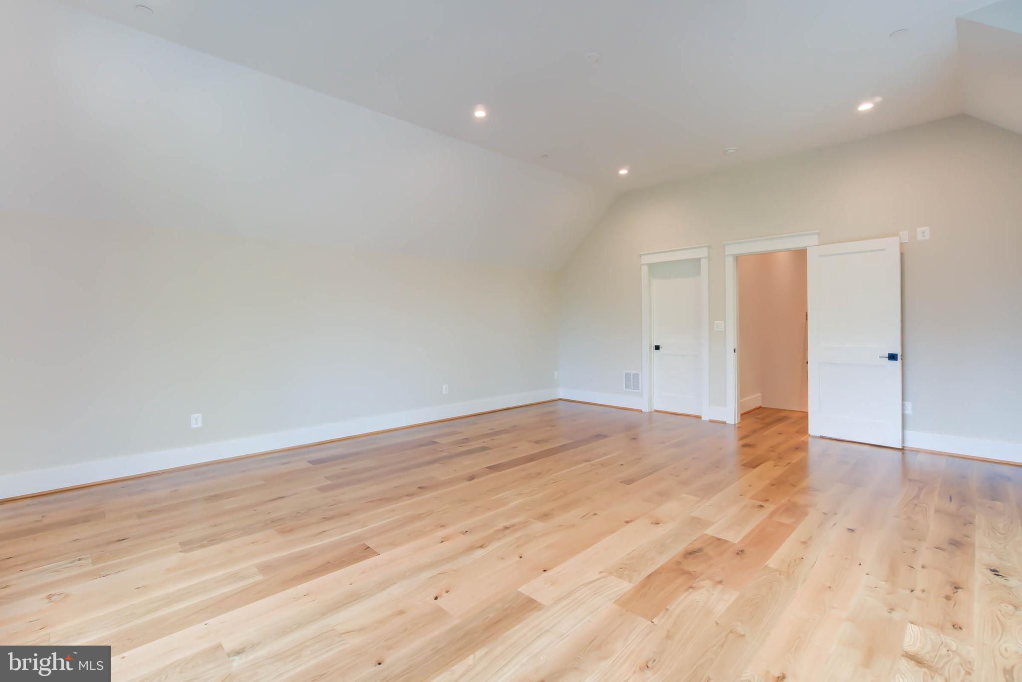 7818 Glenbrook Road Bethesda, MD 20814 - Photo 70 of 95 a view of empty room with wooden floor