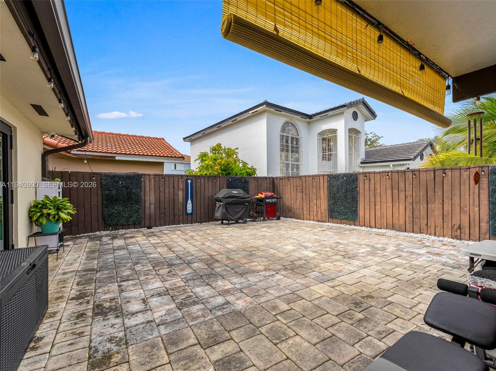 15805 Southwest 79th Terrace Miami, FL 33193 - Photo 39 of 50 a front view of a house with a yard