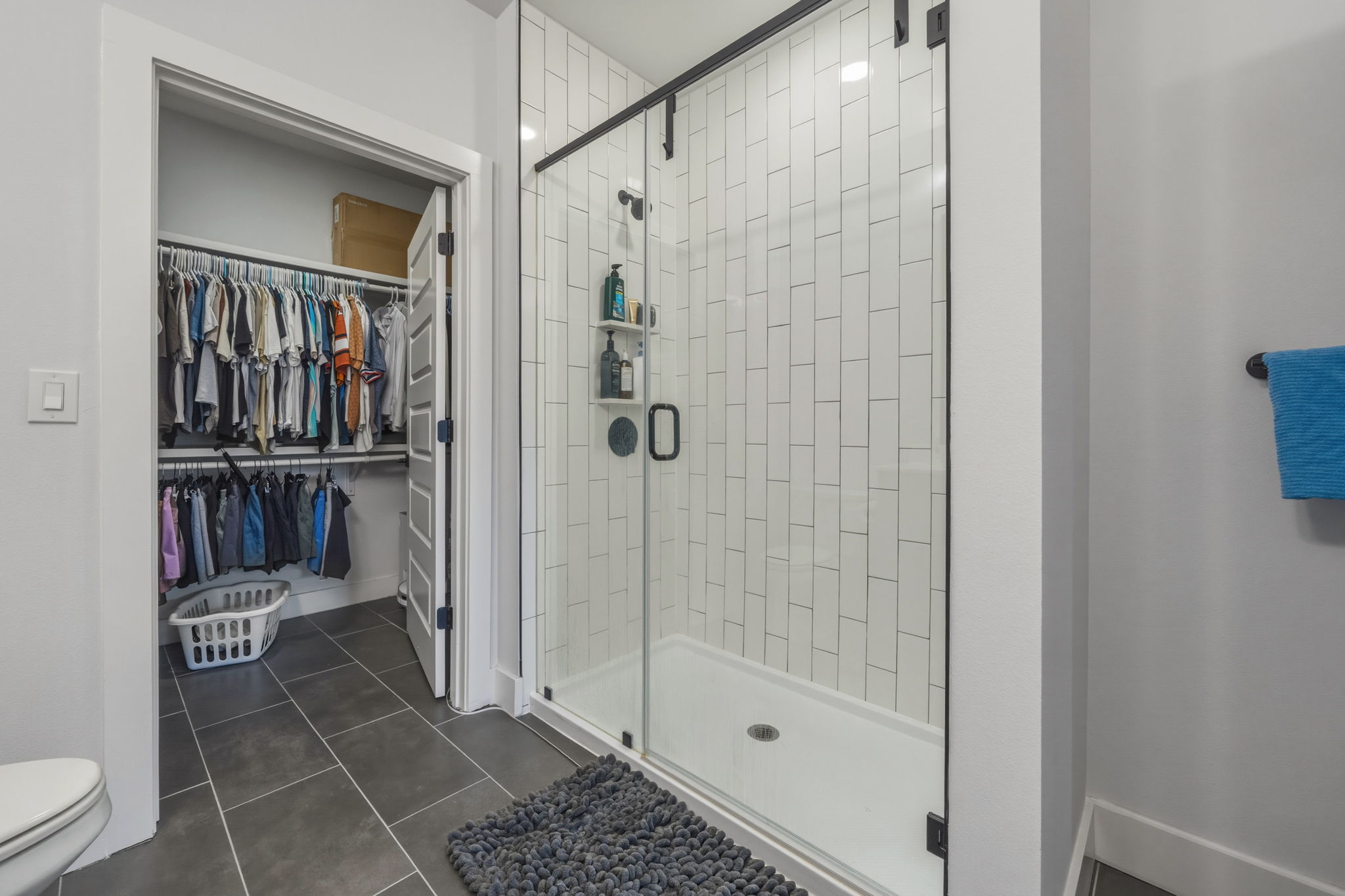 2500 Longview Street, Unit 300 Austin, TX 78705 - Photo 13 of 36 a bathroom with a shower and a toilet