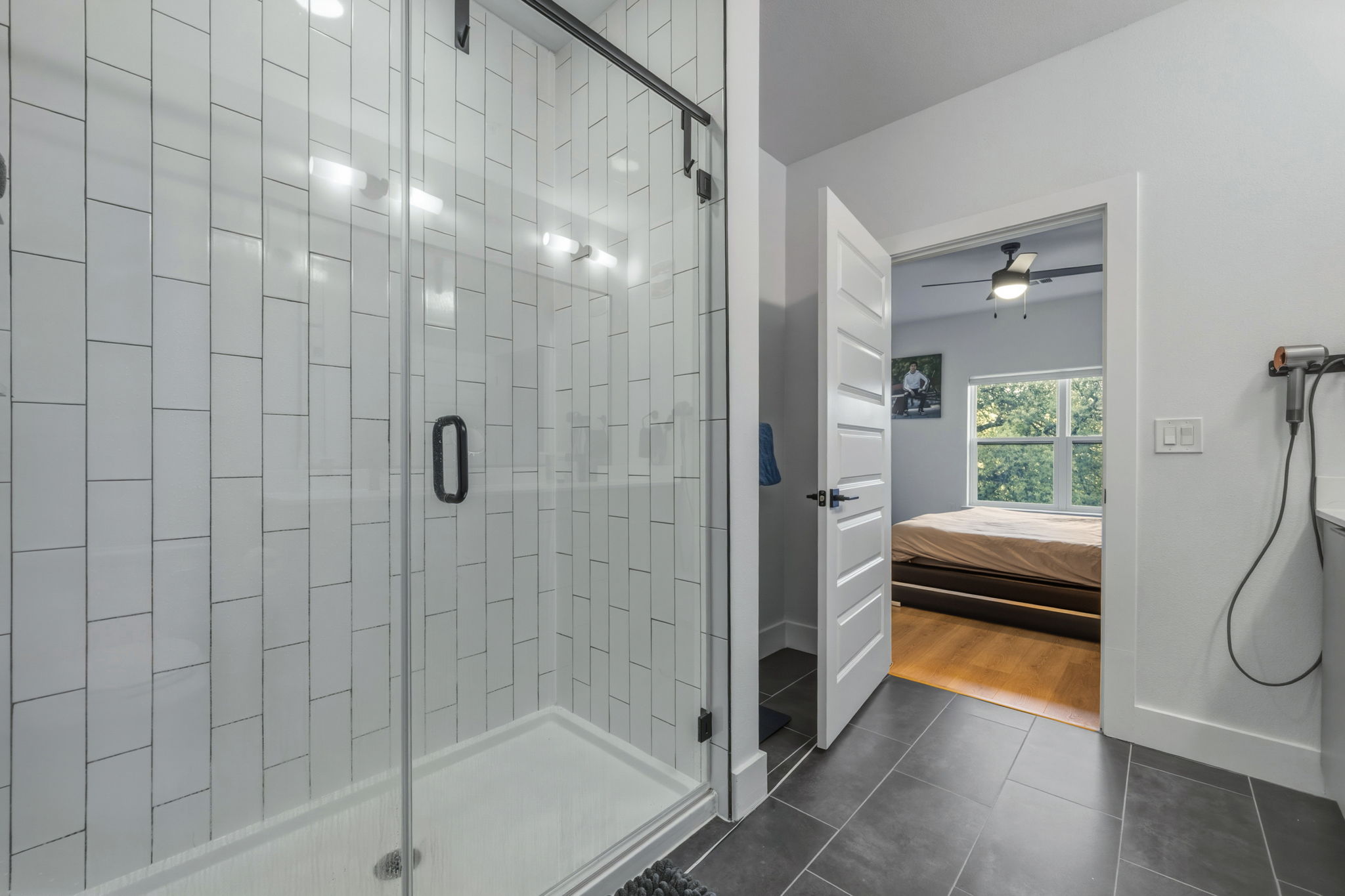 2500 Longview Street, Unit 300 Austin, TX 78705 - Photo 14 of 36 a bathroom with a shower and a bath tub