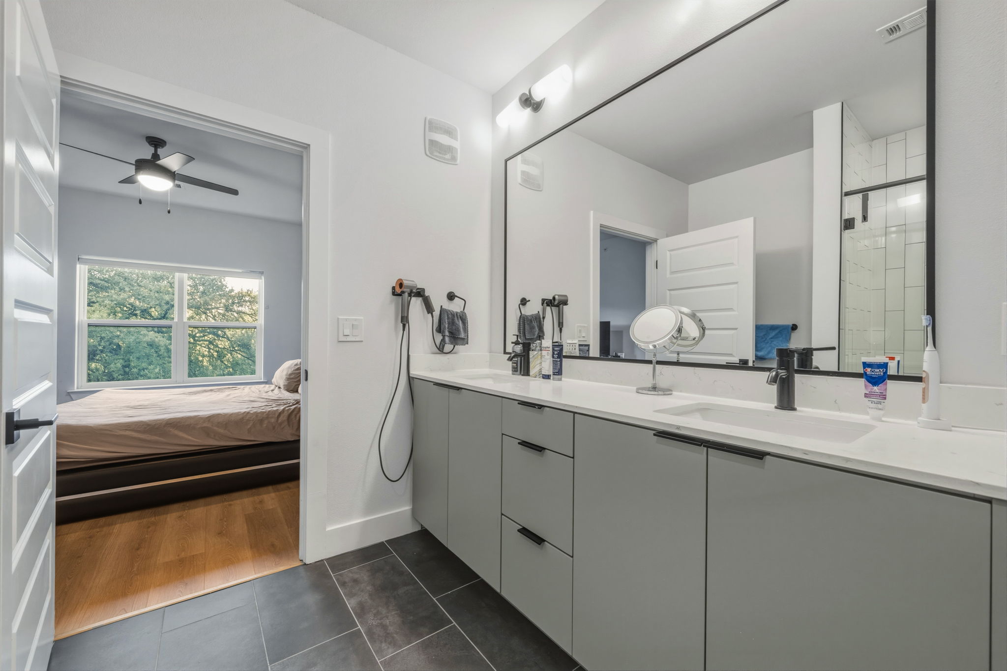 2500 Longview Street, Unit 300 Austin, TX 78705 - Photo 15 of 36 a room with two sink and washing machine