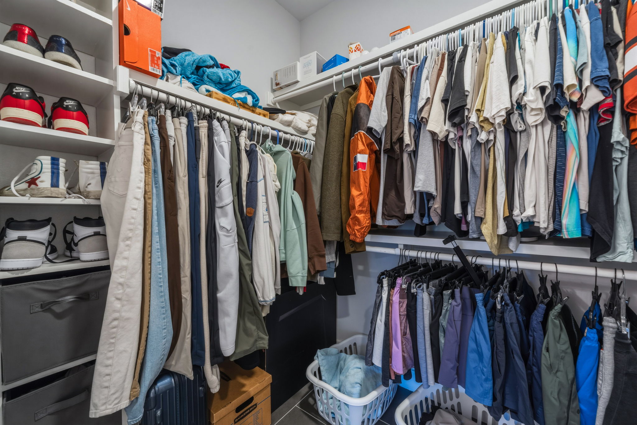 2500 Longview Street, Unit 300 Austin, TX 78705 - Photo 16 of 36 a view of walk in closet with clothes and shoes