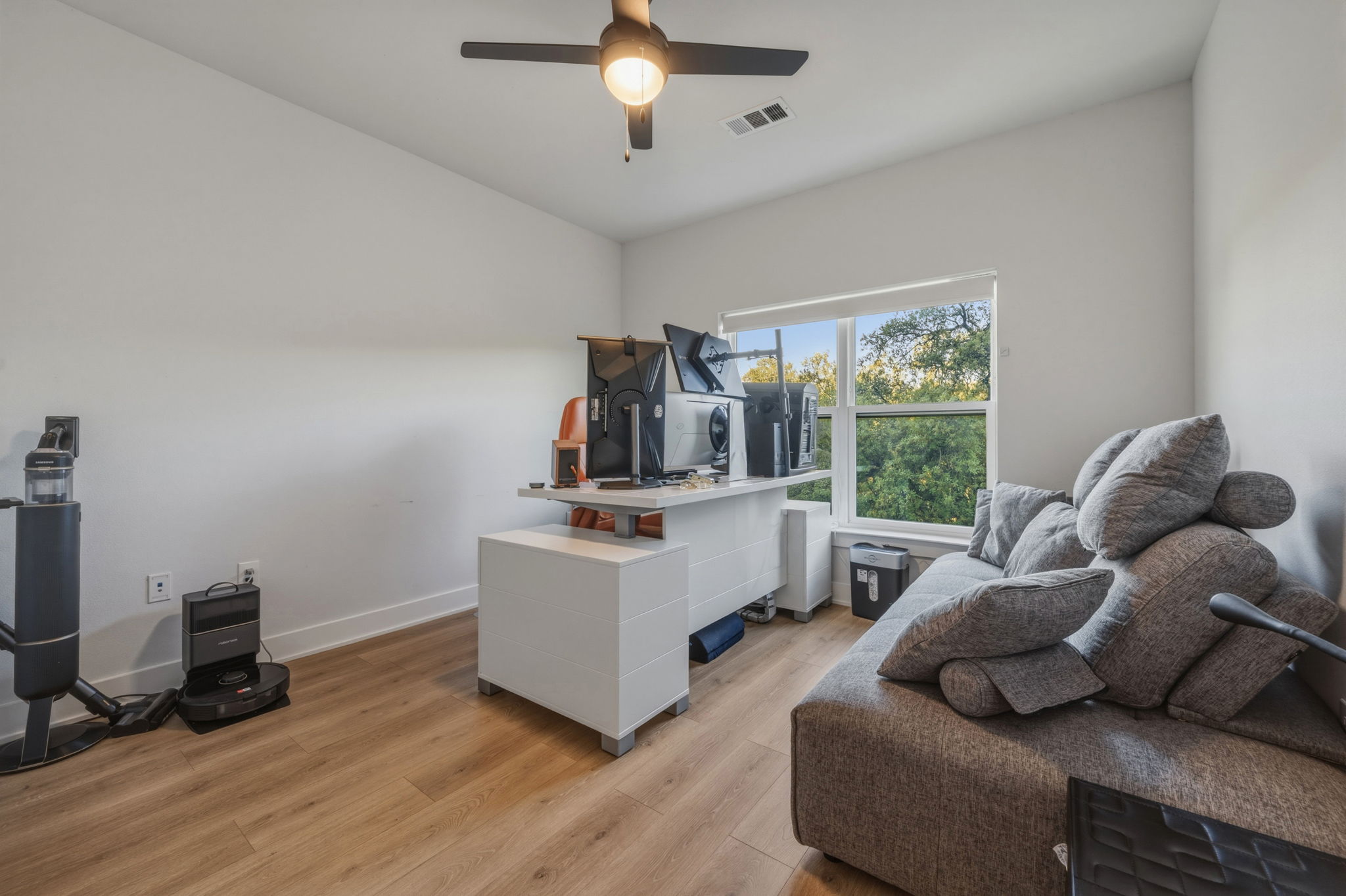 2500 Longview Street, Unit 300 Austin, TX 78705 - Photo 17 of 36 a living room with furniture and a large window