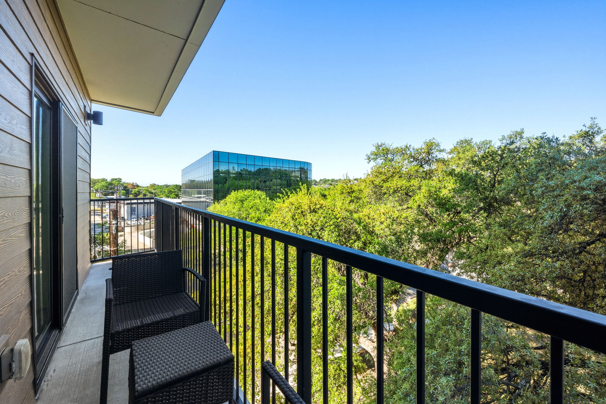 2500 Longview Street, Unit 300 Austin, TX 78705 - Photo 20 of 36 a view of a balcony with chairs