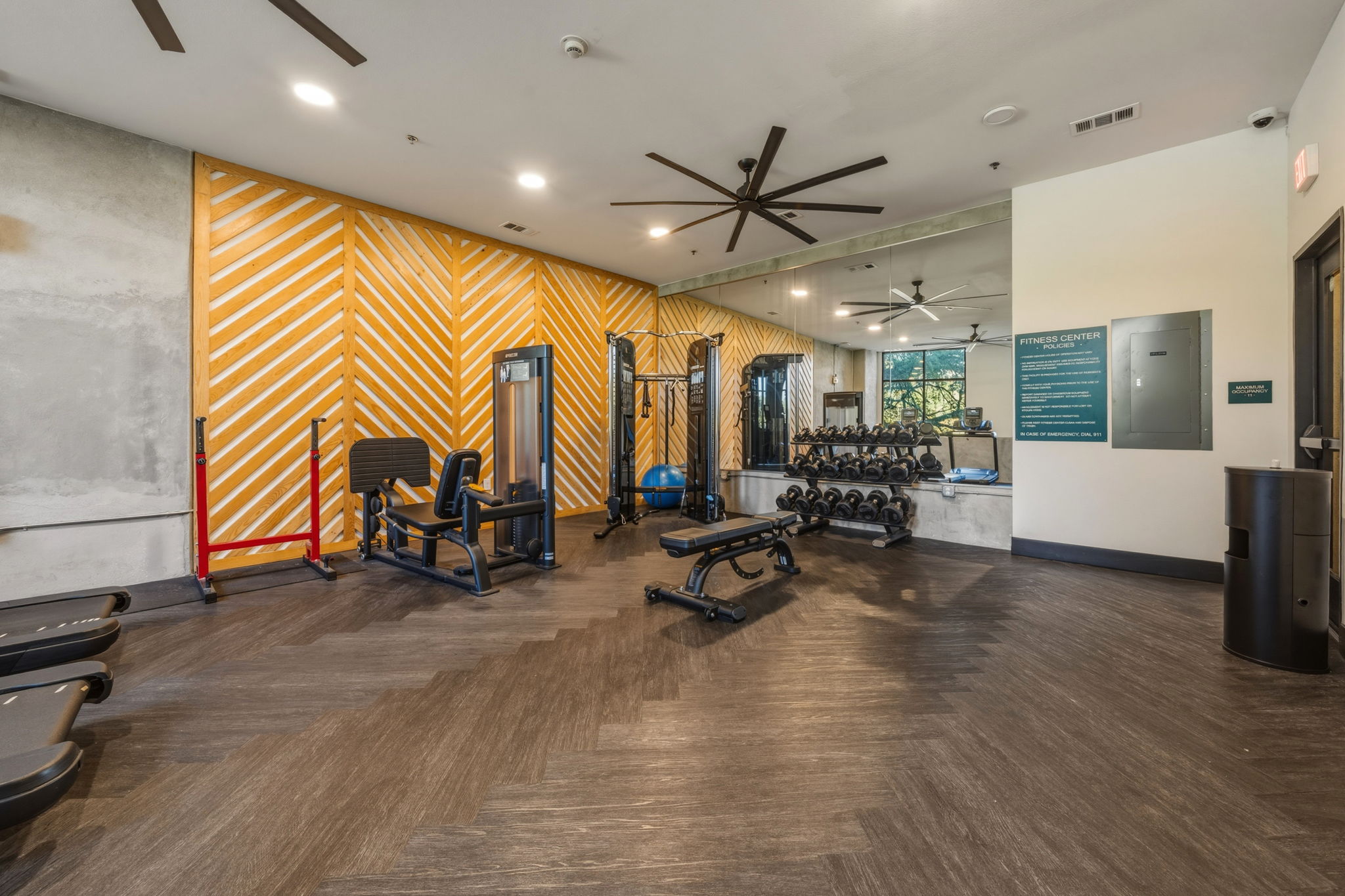 2500 Longview Street, Unit 300 Austin, TX 78705 - Photo 27 of 36 a view of a room with gym equipment and a large window