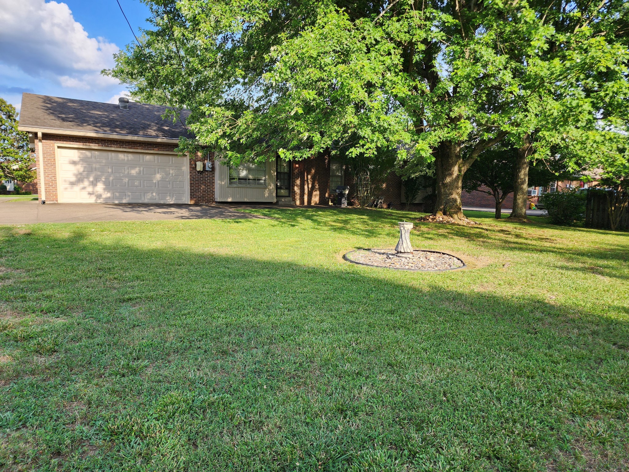 359 Kimbrough Road Clarksville, TN 37043 - Photo 5 of 6 a view of a swimming pool with a big yard and large trees