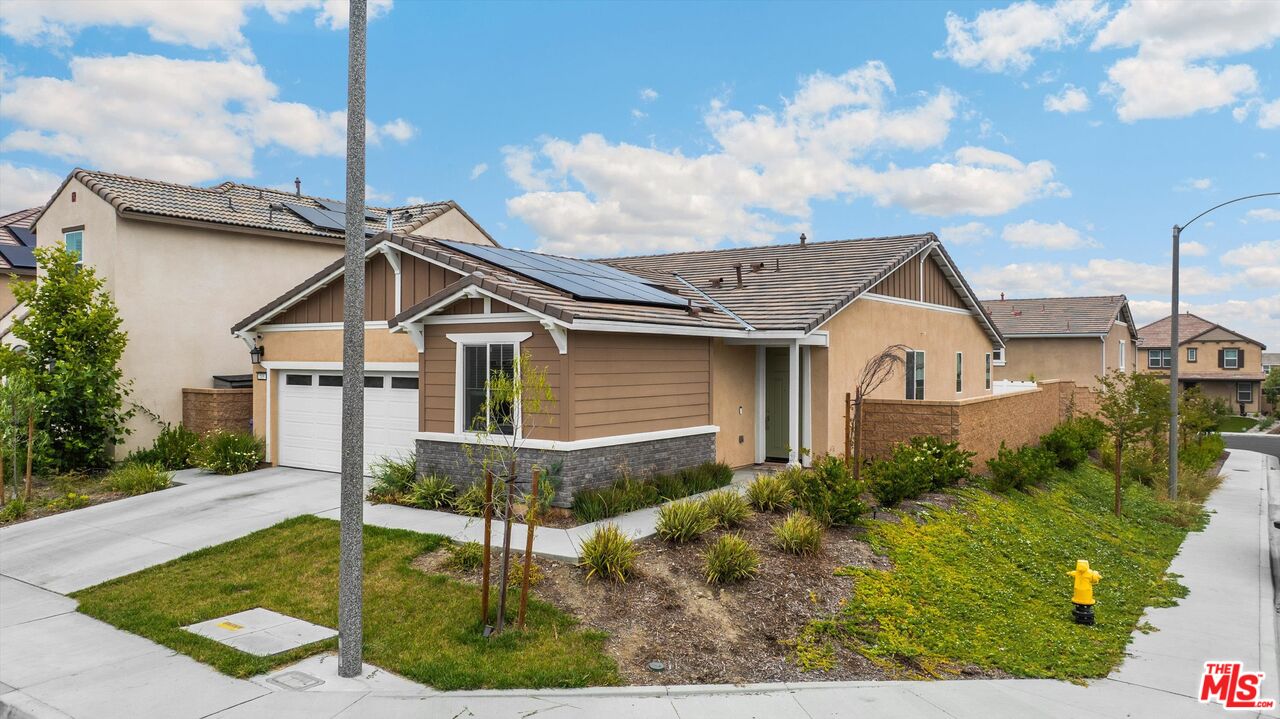 519 Tucker Avenue Rialto, CA 92377 - Photo 15 of 45 a view of a house with a yard