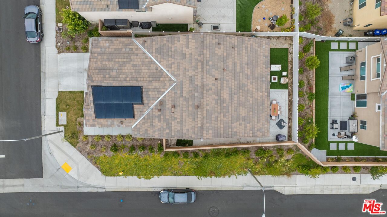 519 Tucker Avenue Rialto, CA 92377 - Photo 45 of 45 an aerial view of a house with swimming pool