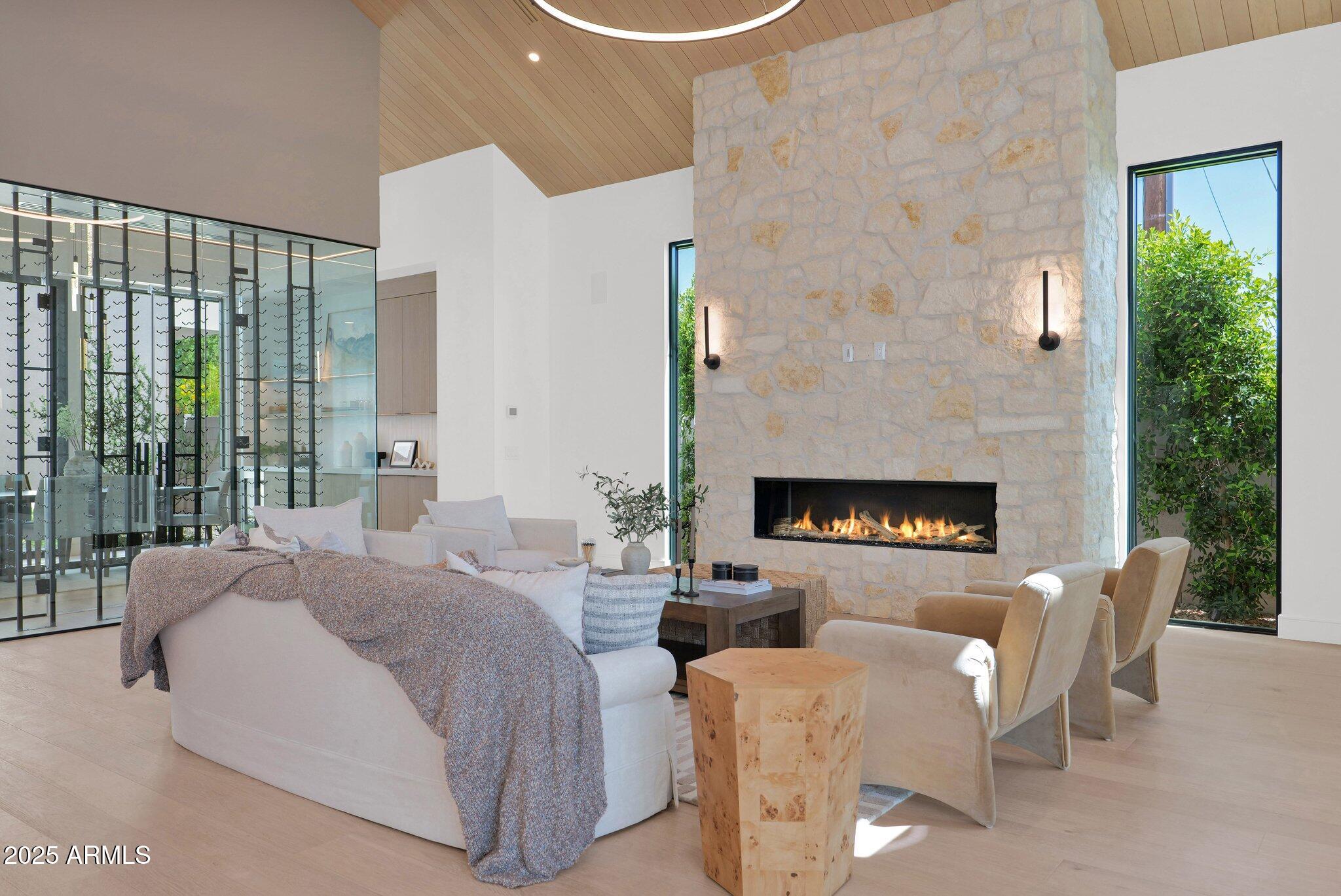 4704 North 40th Place Phoenix, AZ 85018 - Photo 13 of 65 a living room with furniture and a fireplace