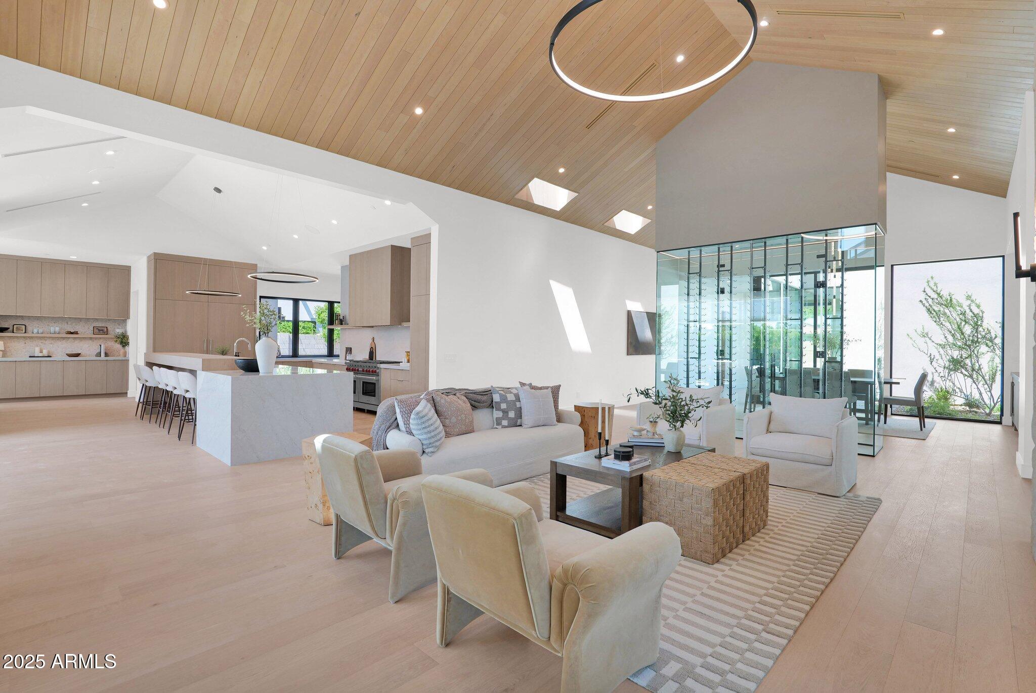 4704 North 40th Place Phoenix, AZ 85018 - Photo 14 of 65 a living room with furniture and a large window