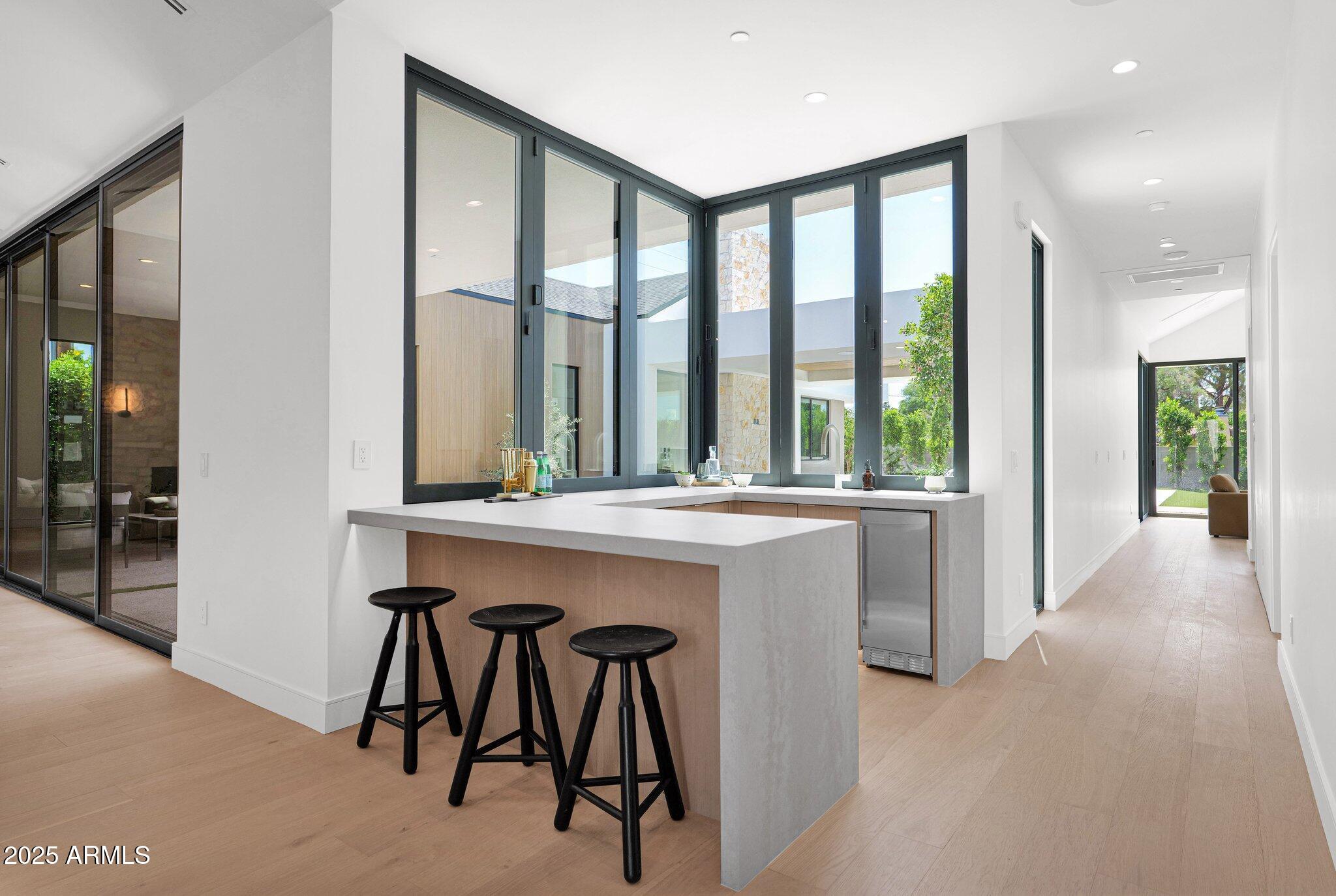 4704 North 40th Place Phoenix, AZ 85018 - Photo 28 of 65 a view of entryway with furniture and window