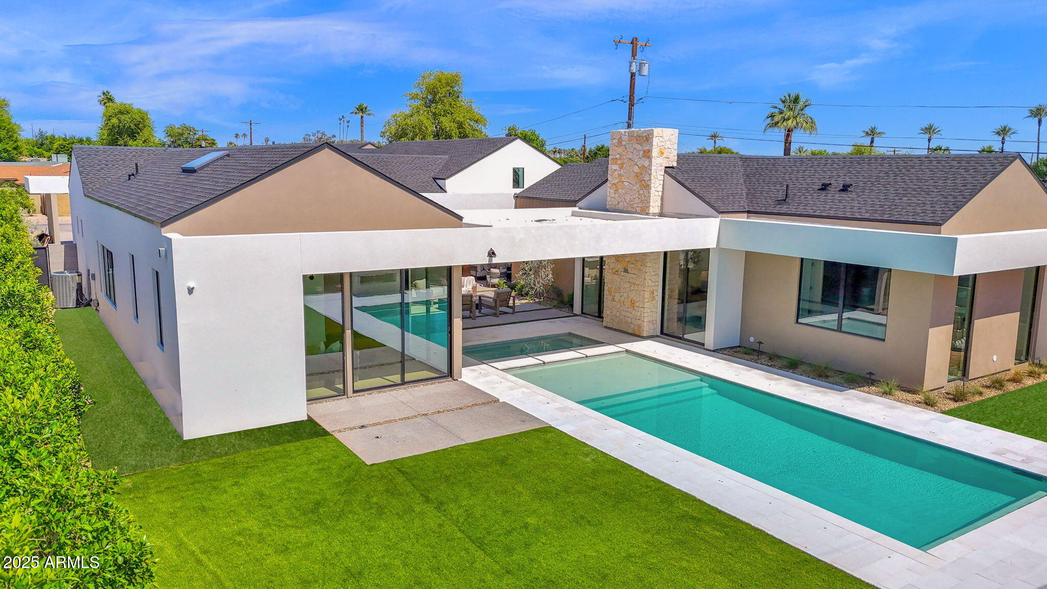 4704 North 40th Place Phoenix, AZ 85018 - Photo 50 of 65 a aerial view of a house with a yard