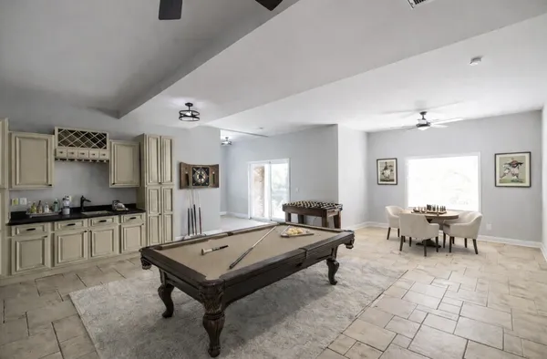 a living room with furniture and a table