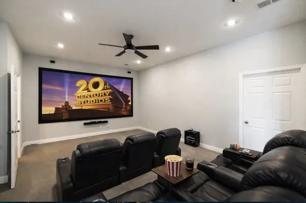 a projector room with furniture