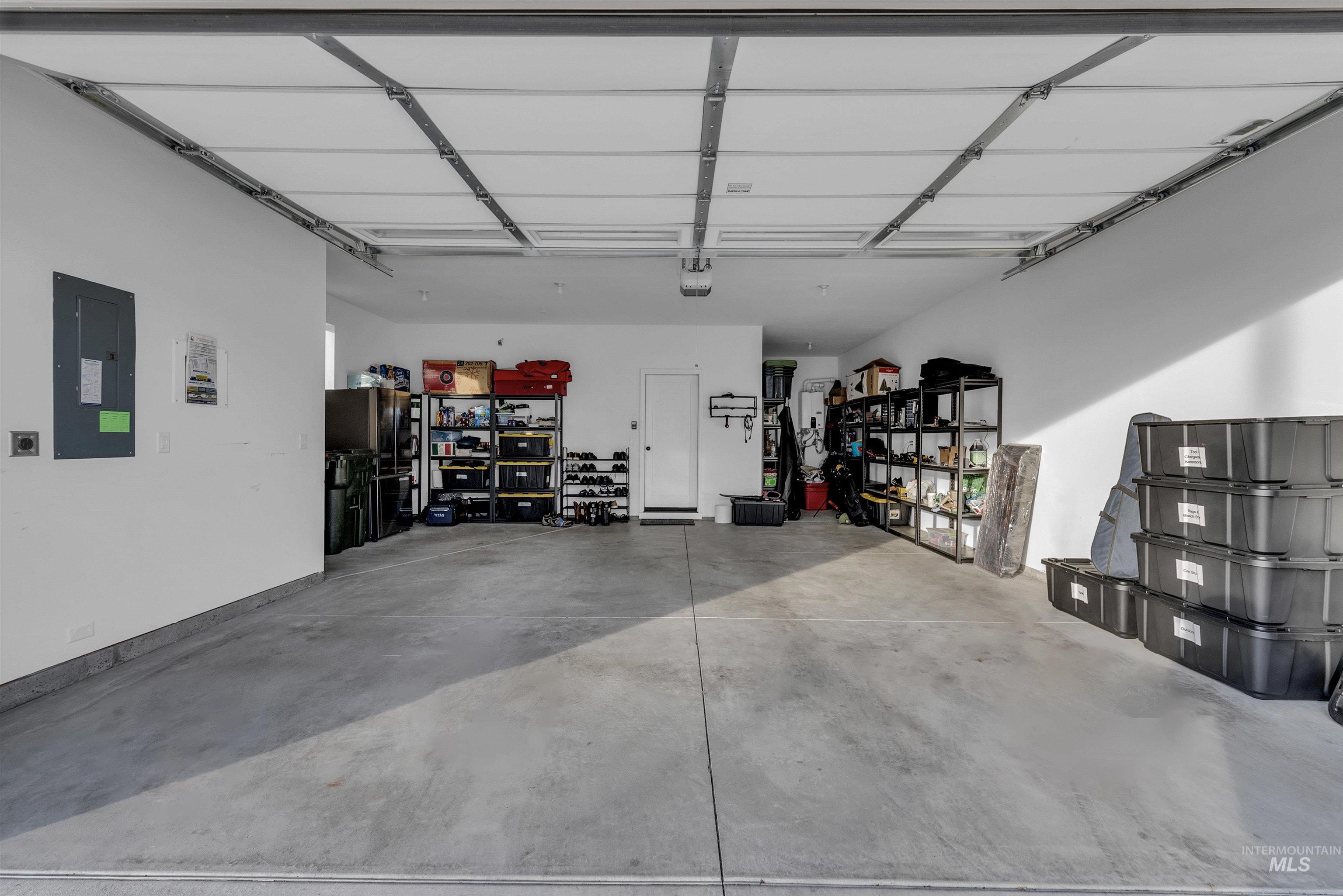 4678 West Riva Capri Street Meridian, ID 83646 - Photo 28 of 30 Garage featuring electric panel