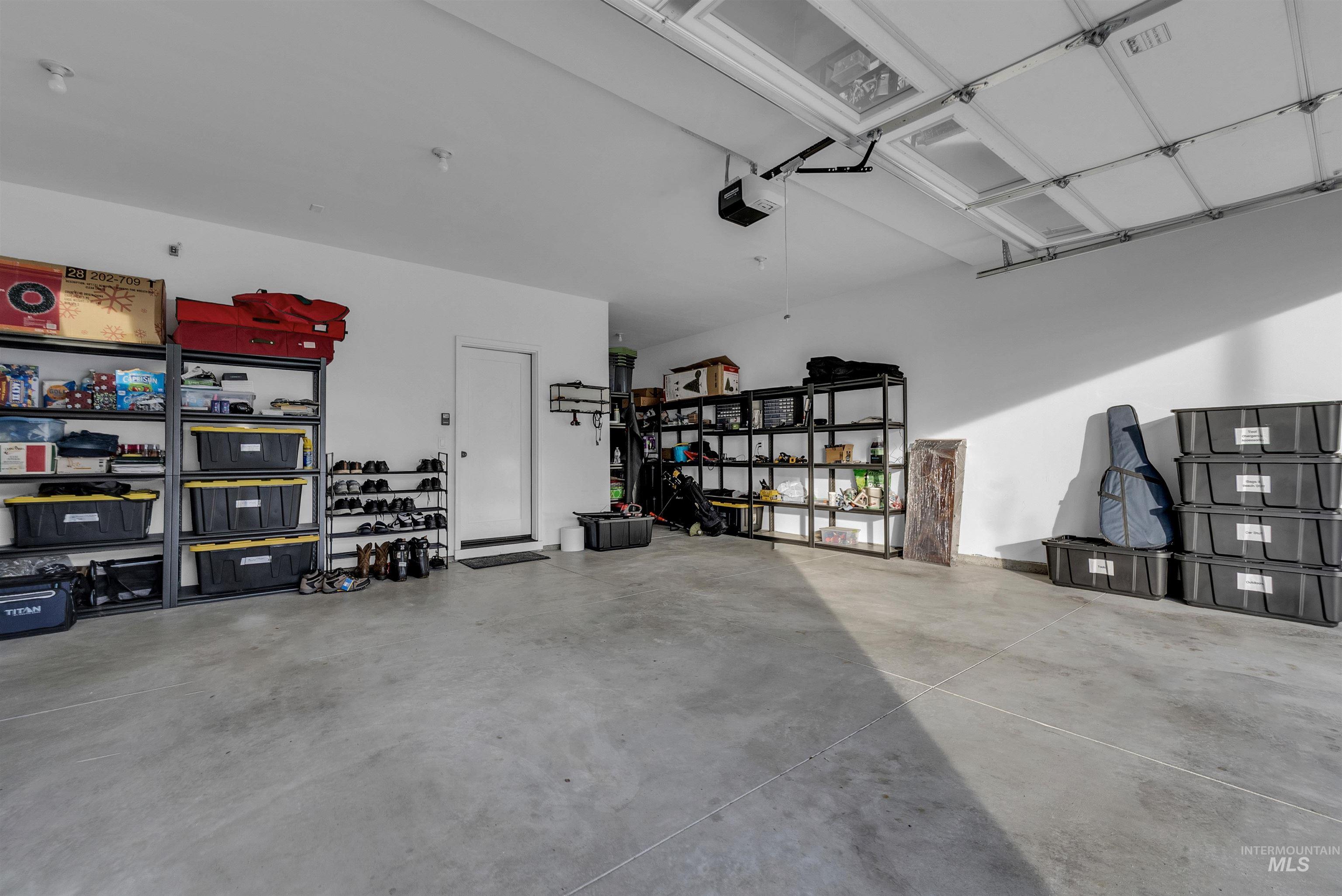 4678 West Riva Capri Street Meridian, ID 83646 - Photo 29 of 30 View of garage