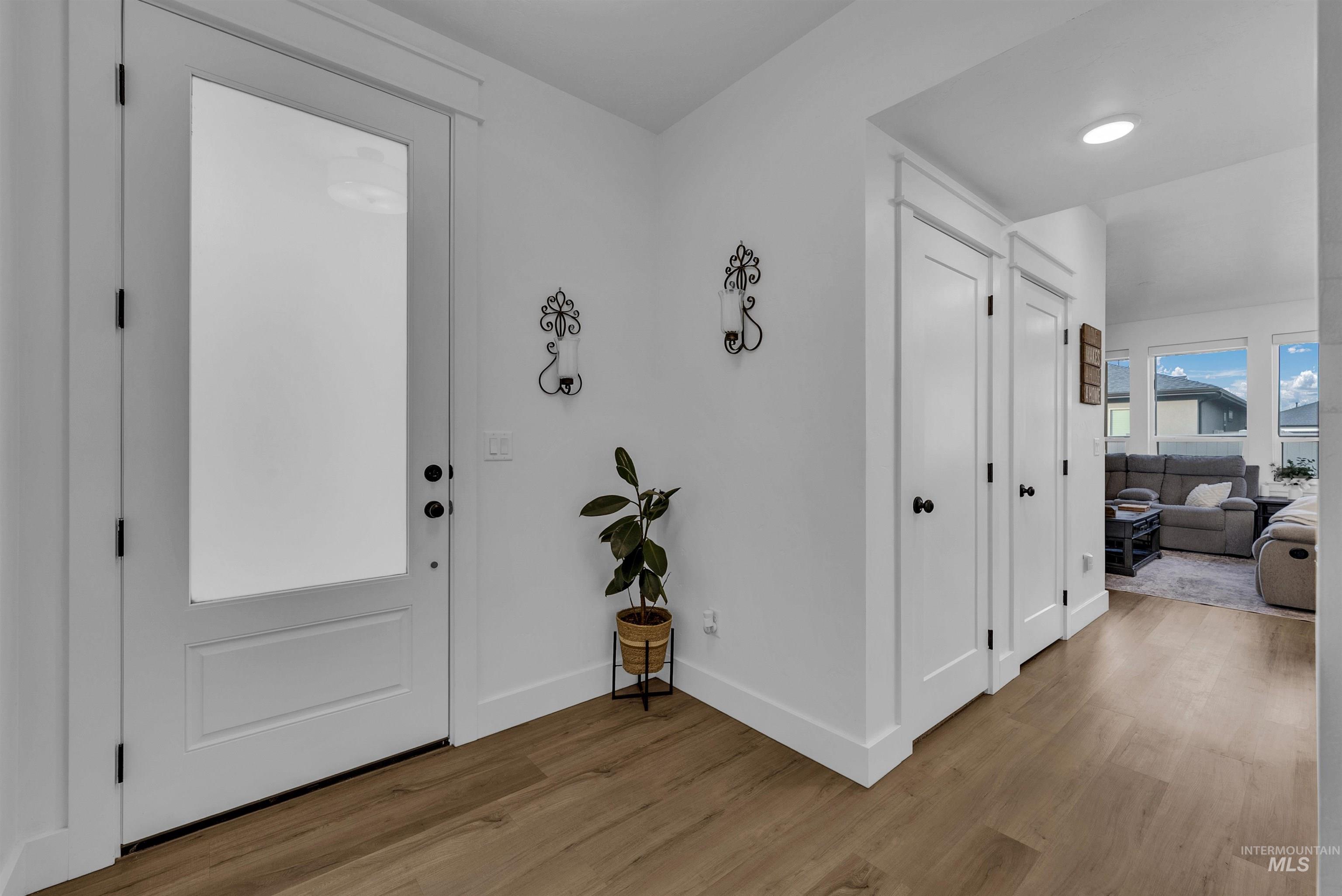 4678 West Riva Capri Street Meridian, ID 83646 - Photo 5 of 30 Entrance foyer featuring light wood finished floors
