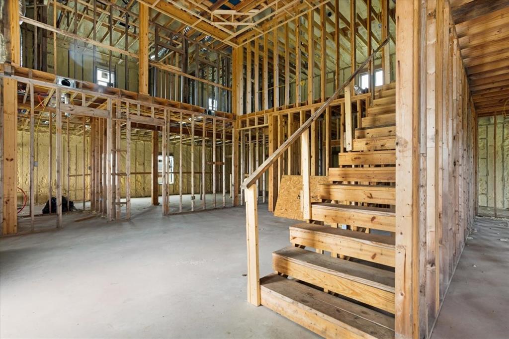 2463 County Road Bonham, TX 75418 - Photo 9 of 29 a view of staircase with a rug and a window