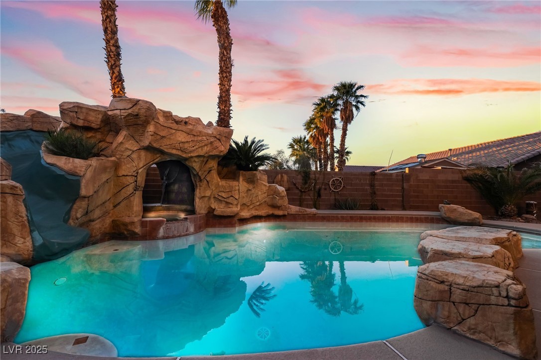 1341 Lime Point Street Las Vegas, NV 89110 - Photo 27 of 29 Sparkling Pool with Spa and Waterfall