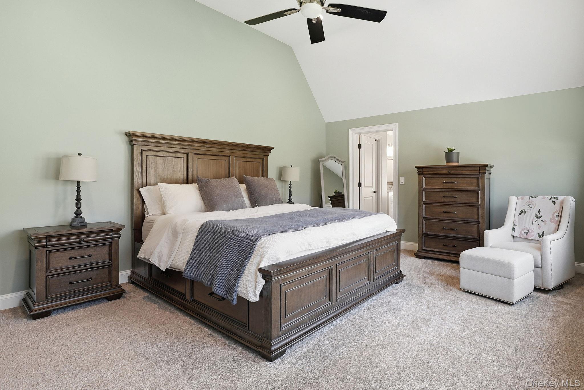 19 Lillian Road Mahopac, NY 10541 - Photo 21 of 50 Bedroom with lofted ceiling, light carpet, and a ceiling fan