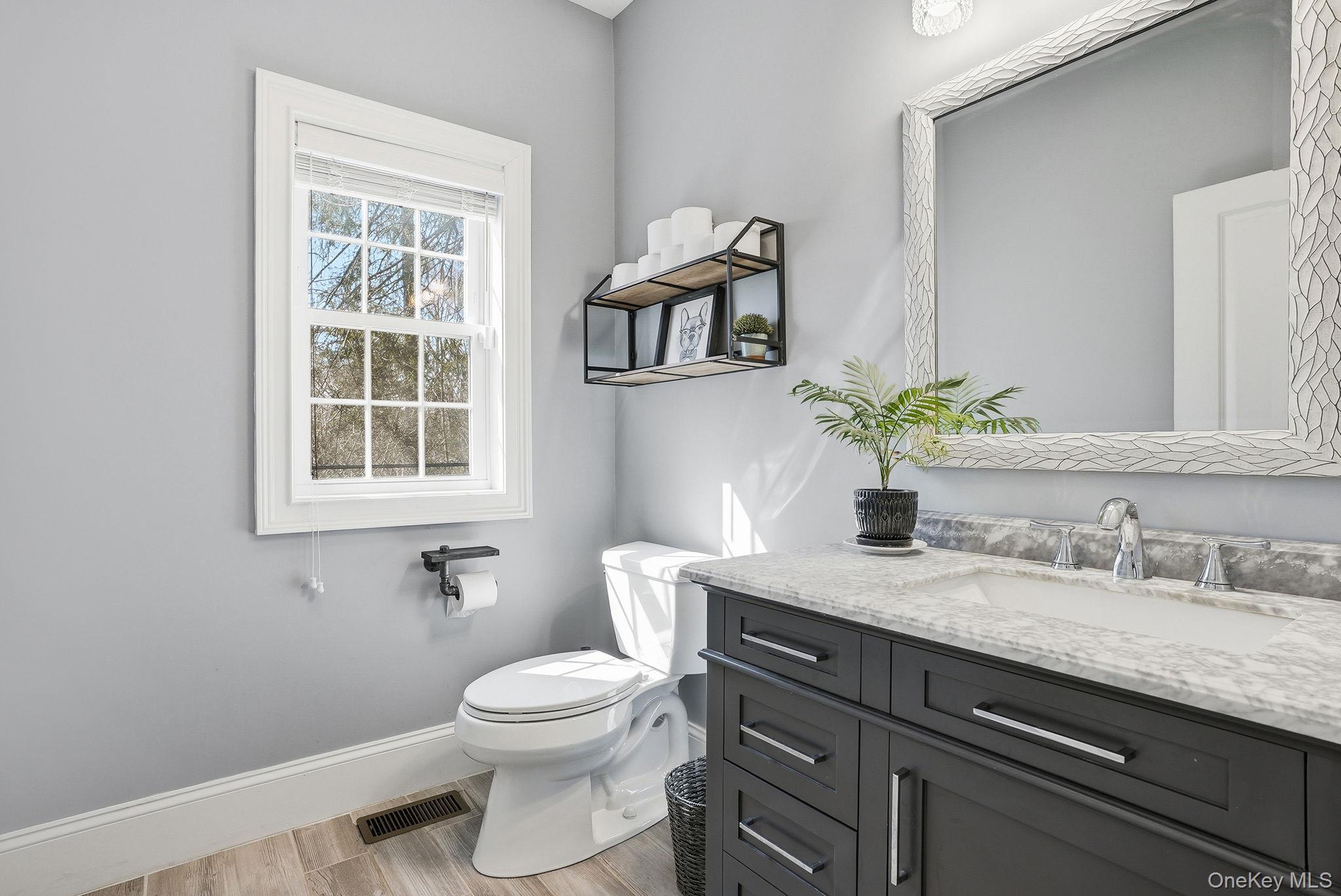 19 Lillian Road Mahopac, NY 10541 - Photo 24 of 50 Bathroom featuring vanity and light wood finished floors