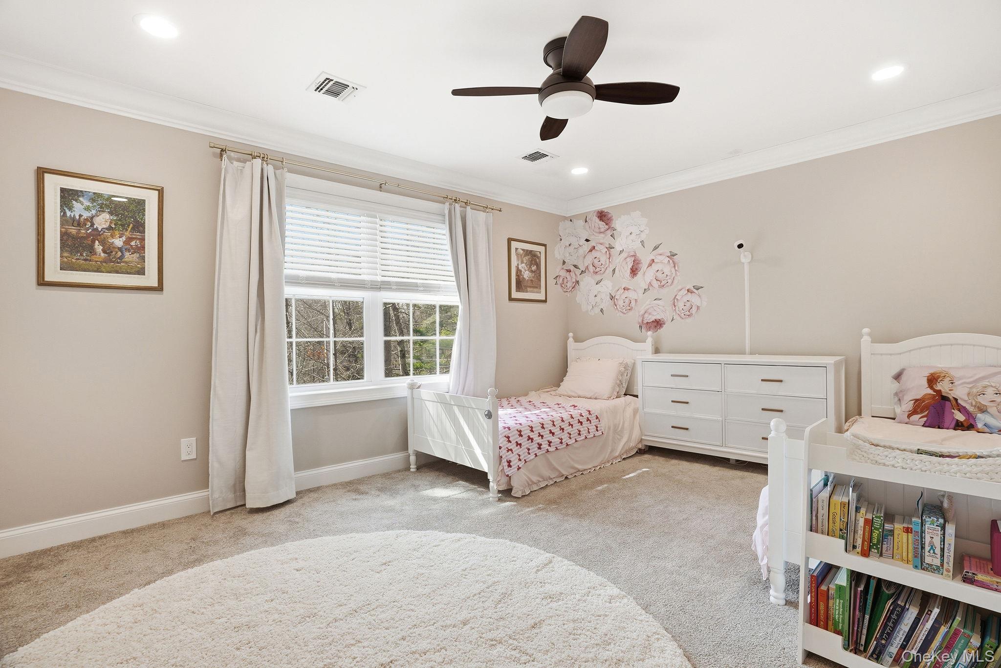 19 Lillian Road Mahopac, NY 10541 - Photo 27 of 50 Carpeted bedroom with crown molding, ceiling fan, and recessed lighting