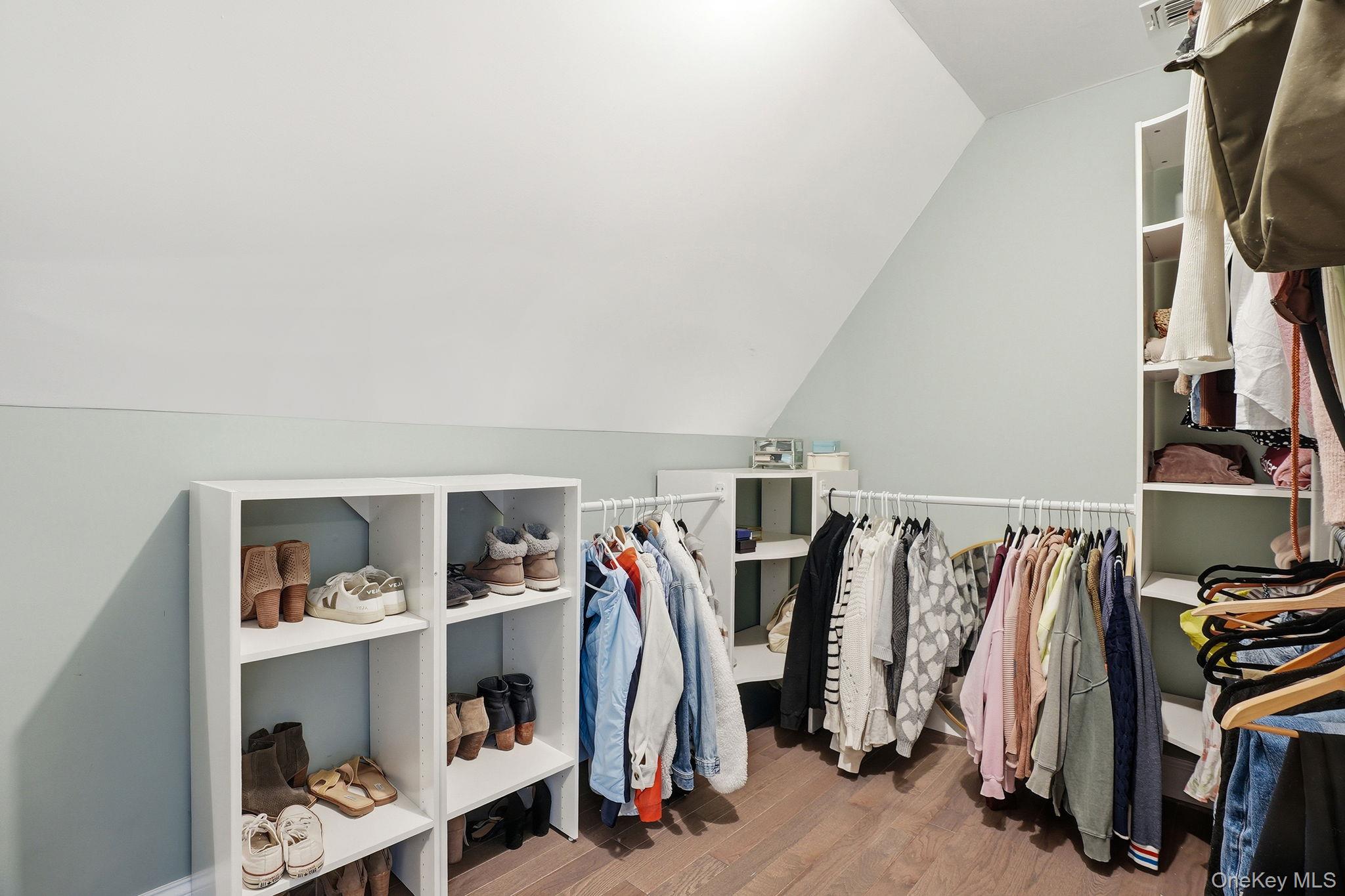 19 Lillian Road Mahopac, NY 10541 - Photo 30 of 50 Walk in closet with lofted ceiling and wood finished floors