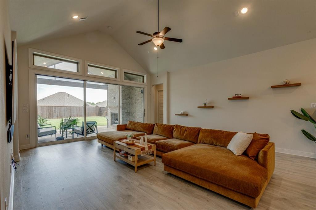 9613 Boulder Pt Road Oak Point, TX 75068 - Photo 11 of 28 Vaulted living space with wood-finish flooring